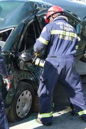 Genesis Hydraulic Cutter being used for auto extrication